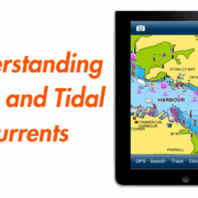 Tablet displaying a nautical chart app for understanding tides and tidal currents with coastal navigation features.