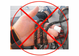 Sailing safety tip: Do not wrap rope around hand. Red crossed circle highlighting wrong technique.