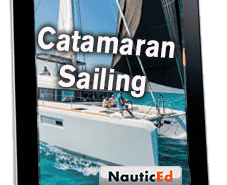 E-book cover on a tablet displaying Catamaran Sailing with NauticEd logo and a sailing catamaran in the background.