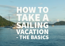 Serene sailing boats at sunset with 'How to Take a Sailing Vacation - The Basics' text overlay on calm sea.