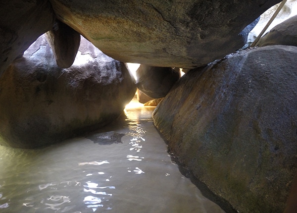 Natural rock formation with waterway at The Baths, Virgin Gorda, inviting exploration and adventure.