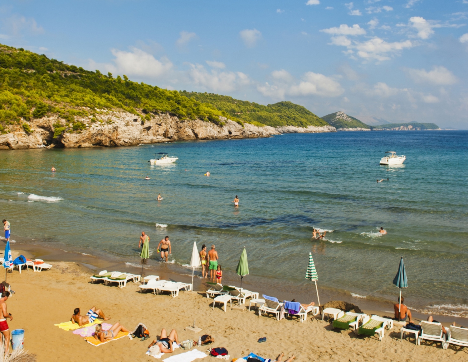 Tourists on Sunj Beach, a sandy beach on Lopud Island, Elaphiti Islands, Dalmatian Coast, Croatia