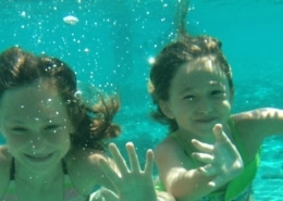 Kids swimming on best family-friendly charter destinations