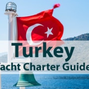 Turkey yacht charter guide with national flag and scenic coastal backdrop. Perfect for sailing vacations.