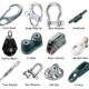 Assorted sailboat hardware: snap hook, swivel block, cleats, shackles, rope jammer, jib sail hank, turnbuckle, pad eye.