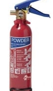 Red powder fire extinguisher with blue handle, essential for boat safety and emergency preparedness on board.