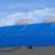 Diagram showing a sailboat's anchor dragging underwater, with arrows indicating anchor path and boat movement.