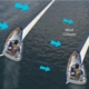 Two sailboats navigate wind conditions of 20 and 10 knots, illustrating sailing dynamics and wind impact.