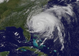 Satellite image of a swirling hurricane over the Atlantic, approaching the southeastern coast of the USA.