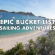 Sandy Island beach with yachts on turquoise sea, promoting Epic Bucket List Sailing Adventures text overlay.