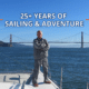 Man standing on sailboat with Golden Gate Bridge in the background, celebrating 25+ years of sailing adventure.