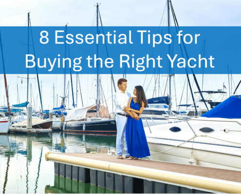 Couple standing by yachts in marina, showcasing essential yacht buying tips for boaters.