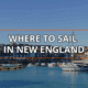 Discover top sailing locations in New England: picturesque harbor with boats and coastal town backdrop. best sailing towns in New England