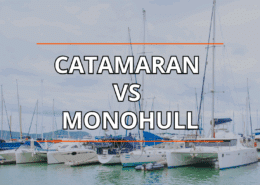 Catamaran and monohull sailboats docked; text Catamaran vs Monohull overlaid, highlighting sailing choice options.