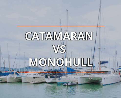 Catamaran and monohull sailboats docked; text Catamaran vs Monohull overlaid, highlighting sailing choice options.