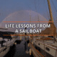 Sailboats docked under a rainbow; text reads Life Lessons from a Sailboat.