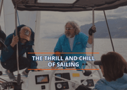Sailors navigating a boat under cloudy skies, embracing the thrill and calm of a scenic sailing adventure.