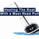 Sailing boat heels with mast head pull technique on water.