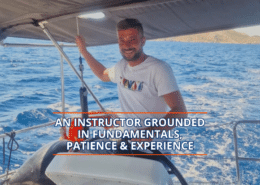 Smiling sailing instructor navigating a boat on the ocean, showcasing expertise and patience.