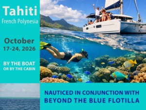 Snorkeling in vibrant Tahiti waters with a sailboat in the background, perfect for adventure enthusiasts.