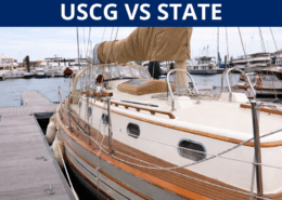Sailboat docked at marina with text USCG VS STATE above, highlighting boating regulations.