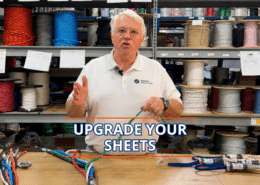 Expert sailor explaining rope selection for optimal sheet upgrades in a maritime supply store.