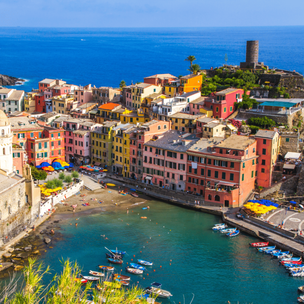 blog-below-deck-destinations-8-Italian Riviera Colorful village in the Italian Riviera with boats in turquoise sea, perfect sunny day, Cinque Terre, Italy. Ideal sailing and travel spot.