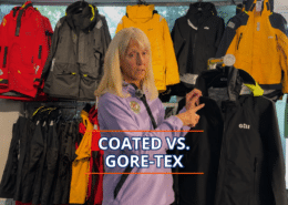 Person comparing sailing jackets: Coated vs. Gore-Tex, with various colors in the background.