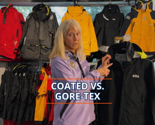 Person comparing sailing jackets: Coated vs. Gore-Tex, with various colors in the background.