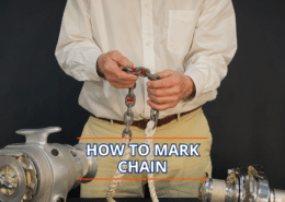 Man demonstrating how to mark an anchor chain, with boat equipment in view.