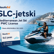 Man on jet ski with NauticEd SLC-jetski license, cruising by a yacht in the Mediterranean Sea.