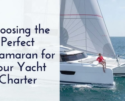 Catamaran sailing on the ocean with a person on deck; guide to choosing the perfect yacht charter.